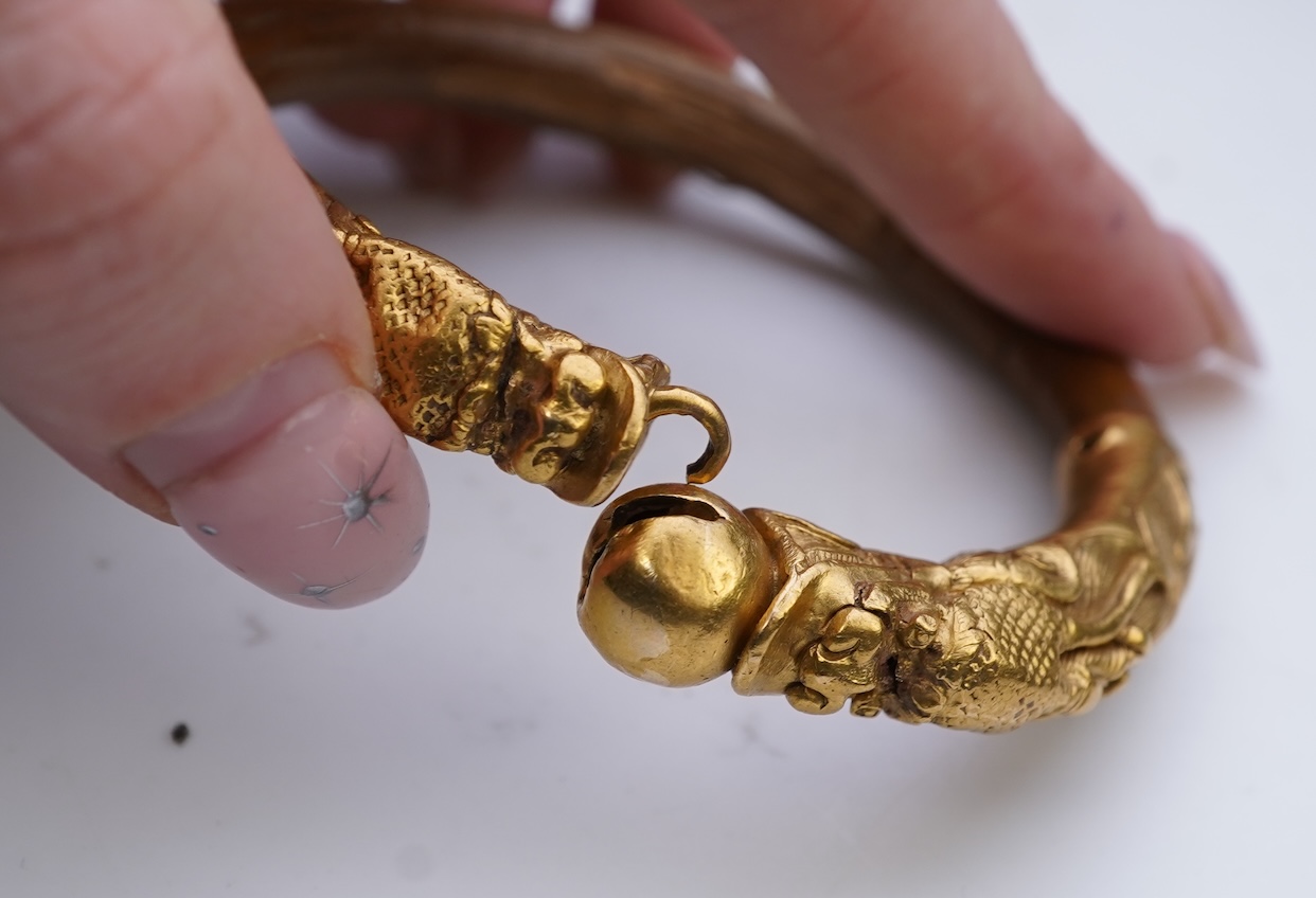 A gold and wood bangle, China, late 19th/early 20th century
